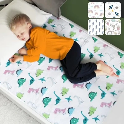 Image of Hygge Sheets® Potty Training Bed Pads 2Pack 100% Waterproof Wetting Sheets for Single and Toddler Beds Non Slip, Easy to Change at Night Includes Free E Book UK Brand Dinosaur