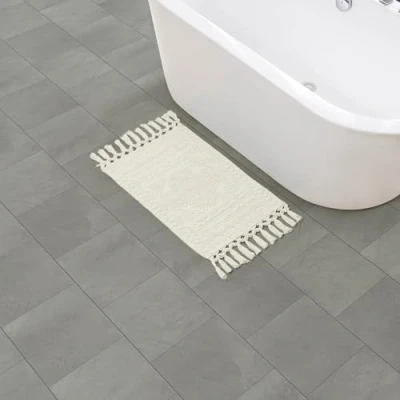 Image of French Connection Nellore Bathroom Rugs, Woven and Beaded Mats, Durable Non Slip Bath Thick BathMats for Shower 17&quot; x 28&quot;, Ivory