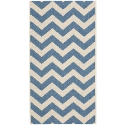 Image of SAFAVIEH Trellis Rug for Indoor &amp; Outdoor Courtyard Collection, Short Pile, in Blue and Beige color, 79 X 152 cm