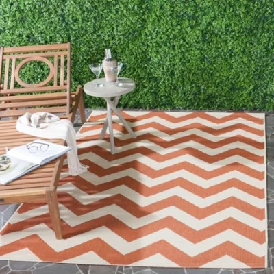 Image of SAFAVIEH Chevron Rug for Indoor &amp; Outdoor Courtyard Collection, Short Pile, in Terracotta and Beige color, 122 X 170 cm