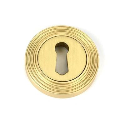 Image of Round Escutcheon (Beehive) Satin Brass