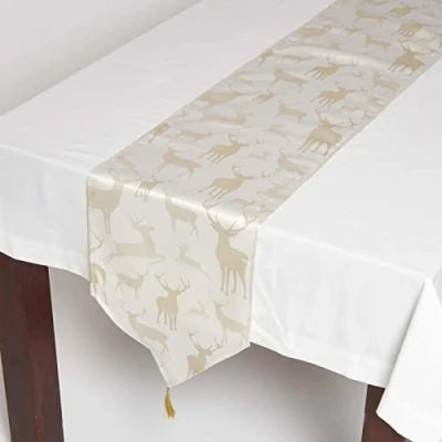 Image of HOMESCAPES Christmas Table Runner Sparkling Gold 32 x 182 cm with Tassels &amp; Stag Xmas Pattern
