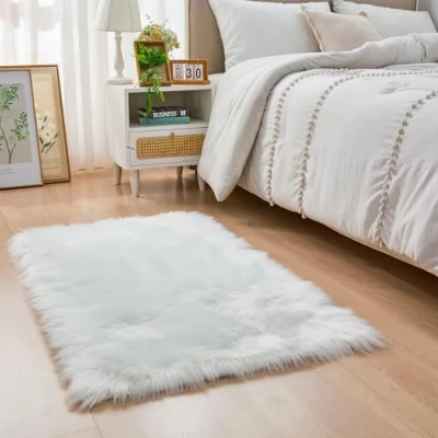 Image of YIHAIC Faux Sheepskin Rug Fur Fluffy and Soft Area for Bedroom Rooms Decor, Shaggy Rugs Cozy Home Feel (White, 60 x 90cm)