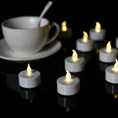 Image of Abrief 50 Pack Tea Lights Candles Battery Operated LED Realistic and Bright Flickering Flameless Candles,for Seasonal &amp; Festival Celebration Warm White Lamp