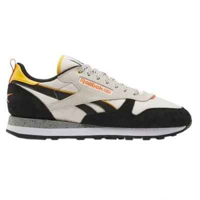 Image of Reebok Unisex&#039;s Classic Leather Sneaker, Alabaster/Black/FIERCEGOLD