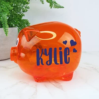 Image of eBuyGB Personalised Transparent Plastic Piggy Bank, Kids Money Box, Saving Jar Keepsake for Children, Novelty Gift (Orange)
