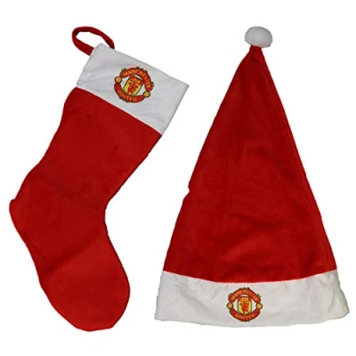 Image of FOCO MANCHESTER UNITED FC SANTA HAT &amp; STOCKING SET WH
