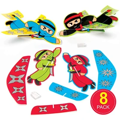 Image of Baker Ross AC867 Ninja Flying Gliders Pack of 8, Bulk Value Toys for Kids Party Bag Fillers, Outdoor Games, Prizes or as Good Behaviour Rewards, Assorted, 8