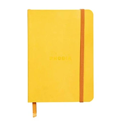 Image of RHODIA 117316C Jonquille Soft Notebook A6 Lined 144 pages Clairefontaine Ivory Paper 90 g/m Bookmark, Elastic Closure Faux Leather Cover Rhodiarama Collection