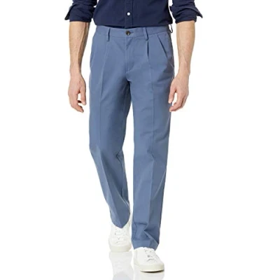 Image of Amazon Essentials Men&#039;s Classic Fit Wrinkle Resistant Pleated Chino Trouser (Available in Big &amp; Tall), Indigo, 34W / 30L