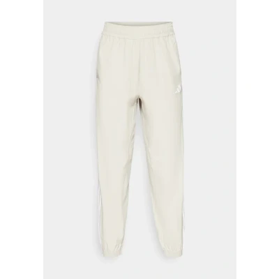Image of adidas Women&#039;s Train Essentials 3 Stripes Woven Pants, Wonder Alumina/White, XXL