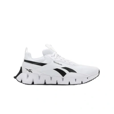 Image of Reebok Unisex Zig DYNAMICA STR Sneaker, FTWWHT/FTWWHT/CBLACK, 2.5 UK