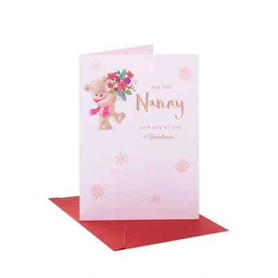 Image of UK Greetings Christmas Card for Nanny Teddy Holding Flowers Design