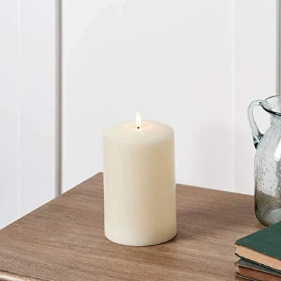 Image of Lights4fun Small TruGlow® Chapel Candle Pillar Battery LED Flameless with Timer 15cm Real Ivory Wax
