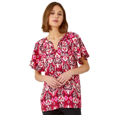 Image of Roman Originals Aztec Print Tie Neck Top for Women UK Ladies Everyday Holiday Spring Summer V Neckline Comfy Soft Evening Vacation Work Party Red Size 10