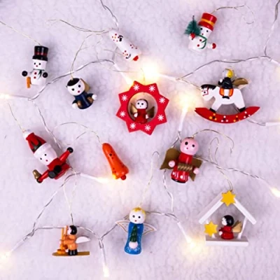 Image of St Helens Home &amp; Garden Wooden Christmas Hanging Decorations Consists of 12 festive designs such as angels, snowmen, drums trains