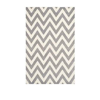 Image of SAFAVIEH Modern Rug for Living Room, Dining Bedroom Cambridge Collection, Short Pile, in Silver and Ivory, 122 X 183 cm