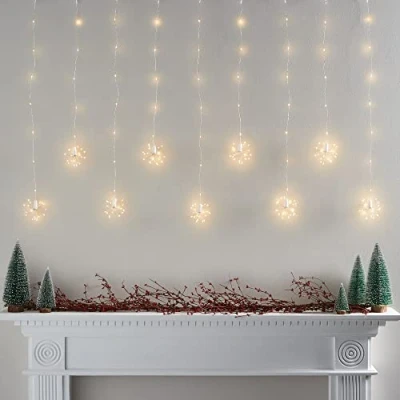 Image of Lights4fun Starburst Curtain Light 235 Warm White LEDs Plug in Timer Indoor &amp; Outdoor Use (W) 1.2m