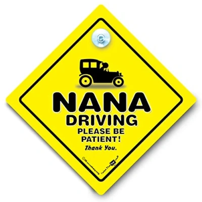 Image of Nana Driving Please be Patient Car Sign. Yellow and Black Window Sign with Rubber Suction Cup