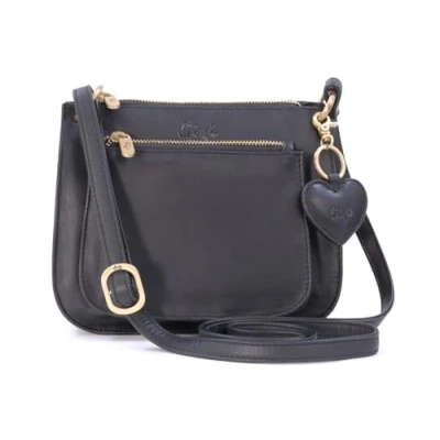 Image of Gigi Women&#039;s Small Leather Cross Body Handbag Shoulder Bag With Long Adjustable Strap Heart Keyring Charm OTHELLO 9975 Black