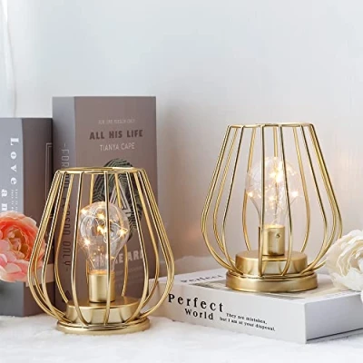 Image of TRIROCKS 2 Set of Metal Battery Operated Lamp 17cm Tall Cage Shape Cordless Table Lanterns with Warm Fairy Lights Bulb for Patio Garden Wedding Parties Indoor Outdoor (Gold)