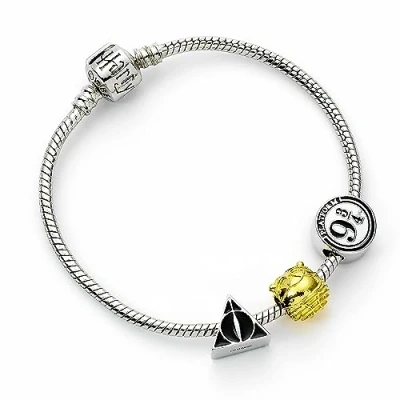 Image of Harry Potter The Carat Shop 9 3/4 17 cm Silver Tone Charm Bracelet with Deathly Hallows, Golden Snitch, centimeters, Stainless Steel, No Gemstone