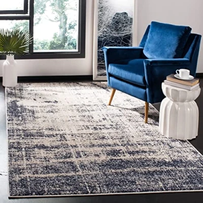 Image of SAFAVIEH Modern Abstract Rug for Living Room, Dining Bedroom Adirondack Collection, Short Pile, in Gold and Navy, 91 X 152 cm