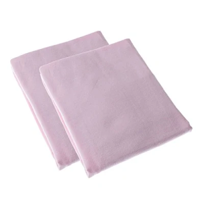 Image of HOMESCAPES Pink Brushed Cotton Fitted Cot Sheet, Set of Two, Plain 100% Cotton, 60 x 120 cm