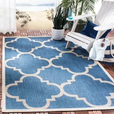 Image of SAFAVIEH Trellis Rug for Indoor &amp; Outdoor Courtyard Collection, Short Pile, in Navy and Beige color, 122 X 170 cm