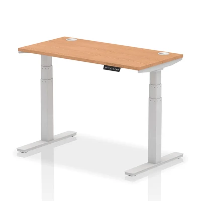 Image of Air 1200 x 600mm Height Adjustable Desk Oak Top Cable Ports Silver Leg