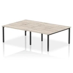 Image of Evolve Plus 1200mm B2B 4 Person Bench Desk Grey Oak Top Black Frame