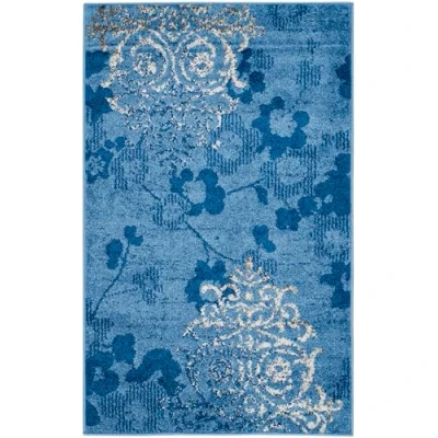 Image of SAFAVIEH Floral Glam Damask Rug for Living Room, Dining Bedroom Adirondack Collection, Short Pile, in Light Blue and Dark Blue, 91 X 152 cm