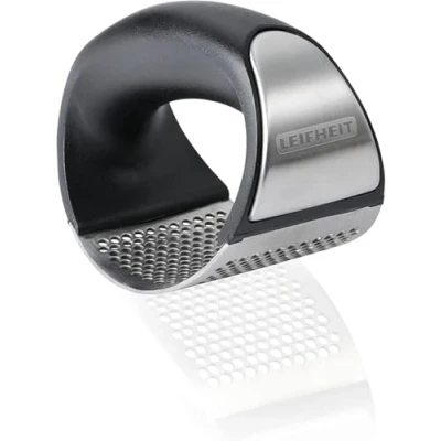 Image of Leifheit Knobi King, garlic press, stainless steel cutter, dishwasher safe, innovative design, kitchen aid, easy to use and clean