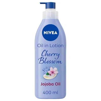 Image of NIVEA Oil In Lotion Cherry Blossom &amp; Jojoba (400ml), Replenishing Body with Floral Scent Pampering Oil, Long Lasting 48H Moisturising Cream,