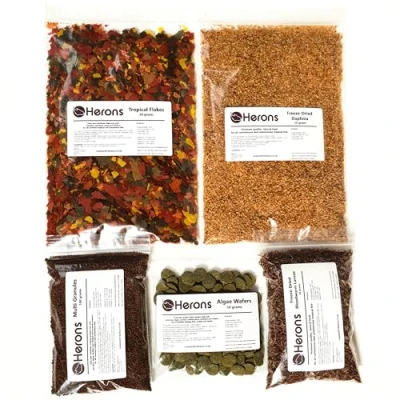 Image of HERONS Premium Tropical Fish Food Pack Multi Granules, Flakes, Algae Wafers, Freeze Dried Daphnia, Bloodworm For all Community Tanks Total of 270 Grams