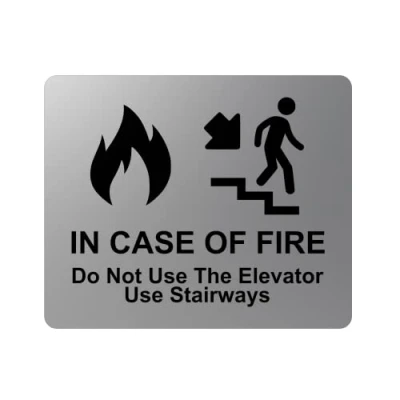 Image of Exit Sign For In Case of Fire Do Not Use Elevator Stairways Sign. Adhesive Sticker Acrylic Sign, Metallic Silver, Engraved Black with Universal Icon Symbol and Text (Size 5&quot; by 4&quot;)