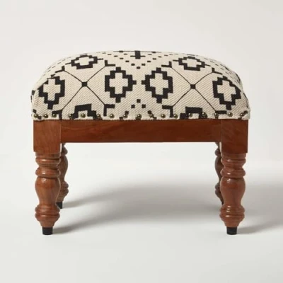 Image of HOMESCAPES Natural and Black Cotton Footstool 50 x 30 cm Reva Rectangle Pouffe on Solid Wood Legs 40 Tall Ottoman Style Upholstered Footrest