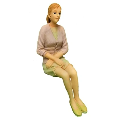 Image of Melody Jane Dolls House Modern Sitting Woman Pink Cardi 1:12 People Resin Figure
