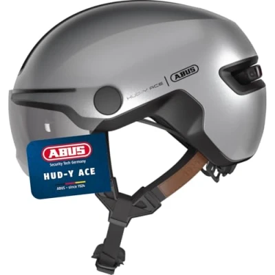 Image of ABUS HUD Y ACE city helmet stylish bike with visor and magnetic, rechargeable rear LED light for men women silver, size L