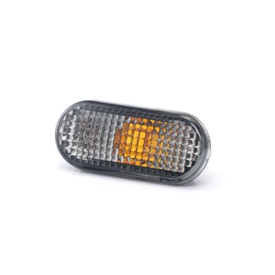 Image of 1091798, 99VW13K309AA Turn Signal TYC 18 3585 21 2 Smoke Grey both sides, lateral installation without bulb holder oval VOLKSWAGEN: Caddy Pickup