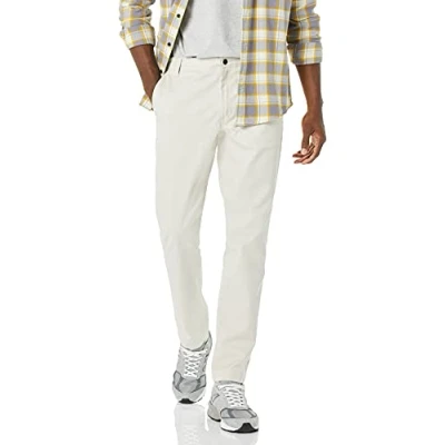 Image of Amazon Essentials Men&#039;s Stain &amp; Wrinkle Resistant Slim Fit Stretch Work Trouser, Light Khaki Brown, 32W / 31L
