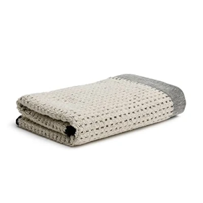 Image of möve Eden towel structured piquée with looped hem 50 x 100 cm made of 80% cotton / 20% linen, nature black