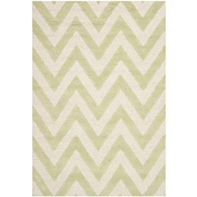 Image of SAFAVIEH Modern Rug for Living Room, Dining Bedroom Cambridge Collection, Short Pile, in Light Green and Ivory, 122 X 183 cm