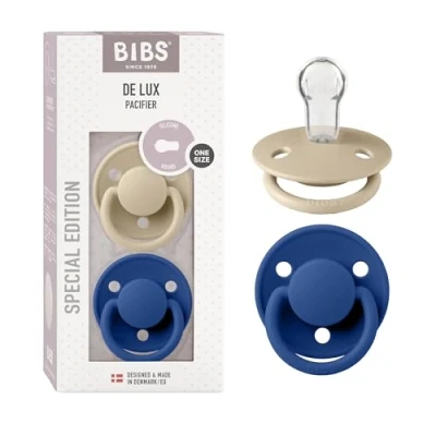 Image of BIBS De Lux Soother 2 Pack, BPA Free Dummy Pacifier, Round Nipple. Silicone, Made in Denmark. 0 36 Months (Pack of 2), Vanilla/Cornflower