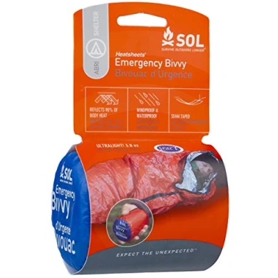 Image of SOL® Emergency Bivvy with Rescue Whistle Tinder Firestarter Reflects 90% body heat Waterproof Windproof Hiking Hunting Backpacking Walking Outdoor Search and Lightweight 99 grms