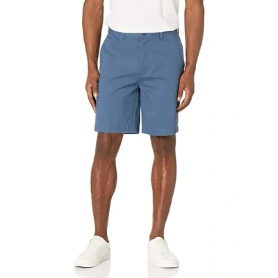 Image of Amazon Essentials Men&#039;s Classic Fit 9 Inch Chino Shorts, Deep Blue, 33W