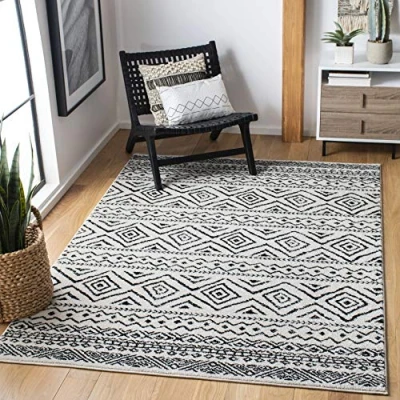 Image of SAFAVIEH Boho Chic Rug for Living Room, Dining Bedroom Tulum Collection, Short Pile, in Ivory and Black, 122 X 183 cm
