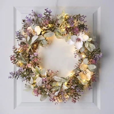 Image of Lights4fun 60cm Oversized Pre Lit Premium Artificial Spring Flower Foliage Wreath for Front Door and Indoor Wall with 50 Warm White LEDs Battery Operated Timer