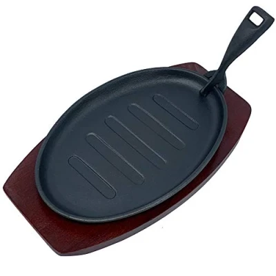 Image of Cast Iron Sizzler Plate Oval Serving Pan, Pre Seasoned Fajita Platter with Wooden Trivet for Hot Sizzling Dishes (27cm x 17.5cm)