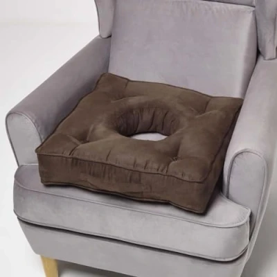 Image of HOMESCAPES Ultimate Comfort Coccyx Cushion for Tailbone Pain Relief Handmade Donut Pillow with Firm Support, Sciatica Relief, Hemorrhoid Chocolate Faux Suede Armchair Booster